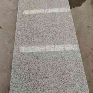 延安芝麻白光面毛板