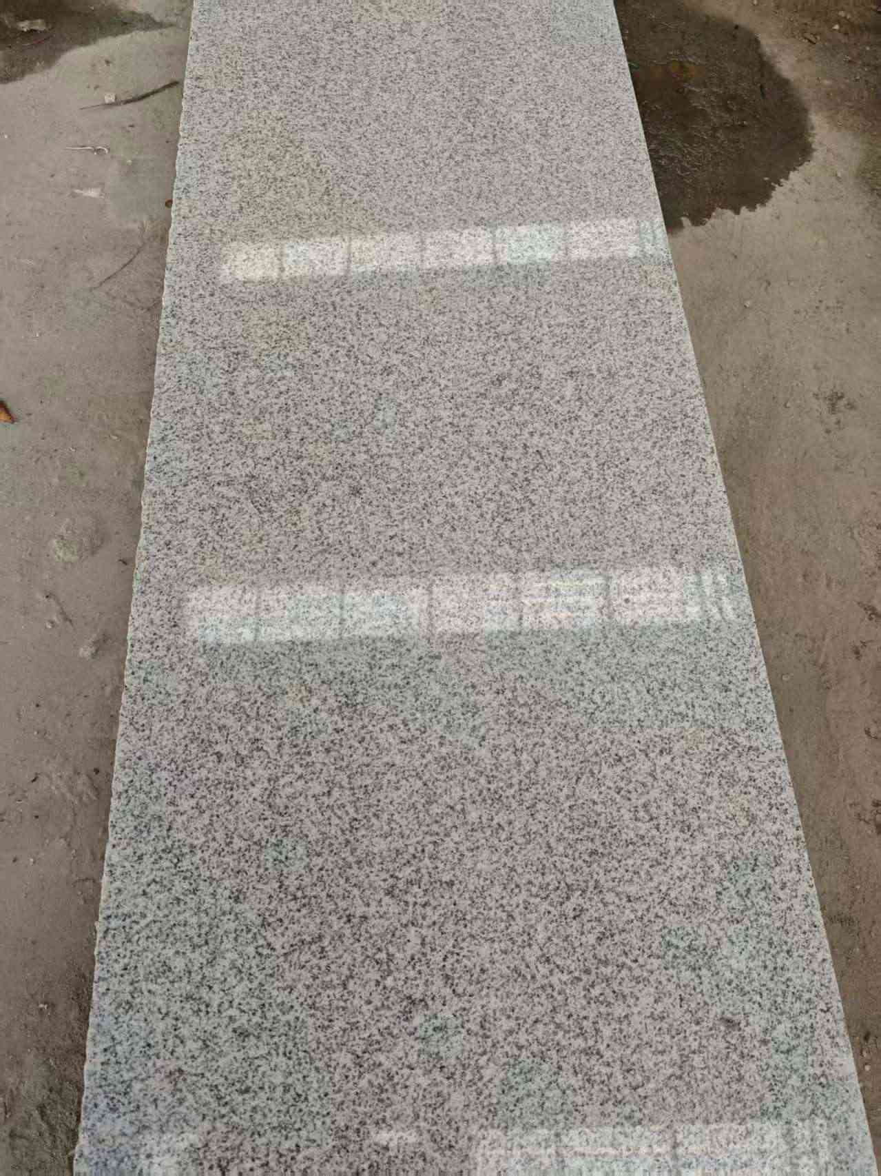 延安芝麻白光面毛板